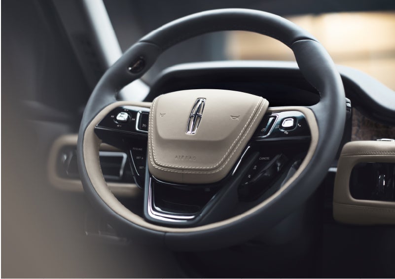 The intuitively placed controls of the steering wheel on a 2023 Lincoln Aviator® SUV | Bergstrom Lincoln of Neenah in Neenah WI