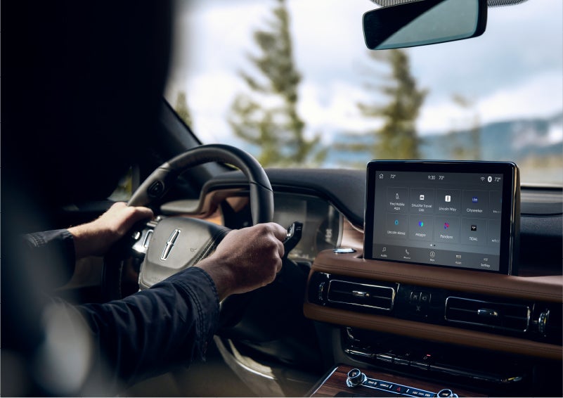 The Lincoln+Alexa app screen is displayed in the center screen of a 2023 Lincoln Aviator® Grand Touring SUV | Bergstrom Lincoln of Neenah in Neenah WI