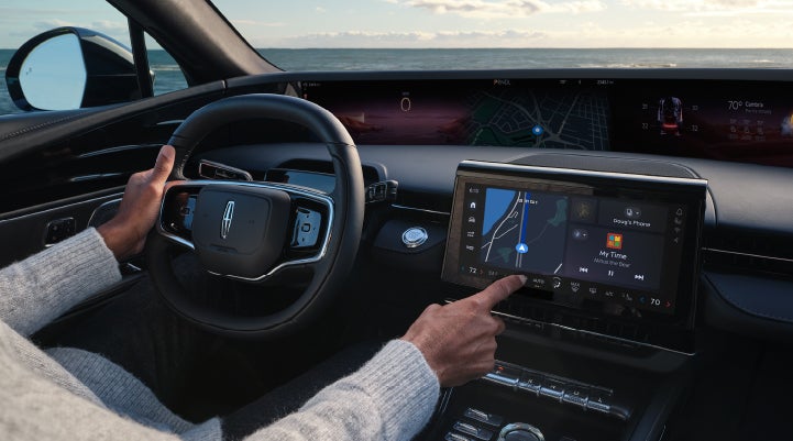The driver of a 2024 Lincoln Nautilus® SUV interacts with the new Lincoln Digital Experience. | Bergstrom Lincoln of Neenah in Neenah WI