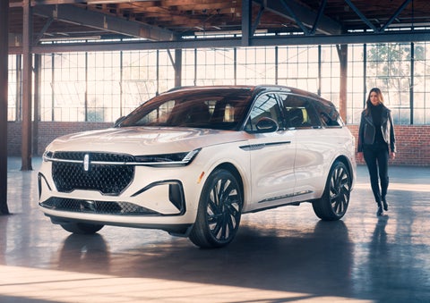 A person approaches a 2024 Lincoln Nautilus® SUV. | Bergstrom Lincoln of Neenah in Neenah WI