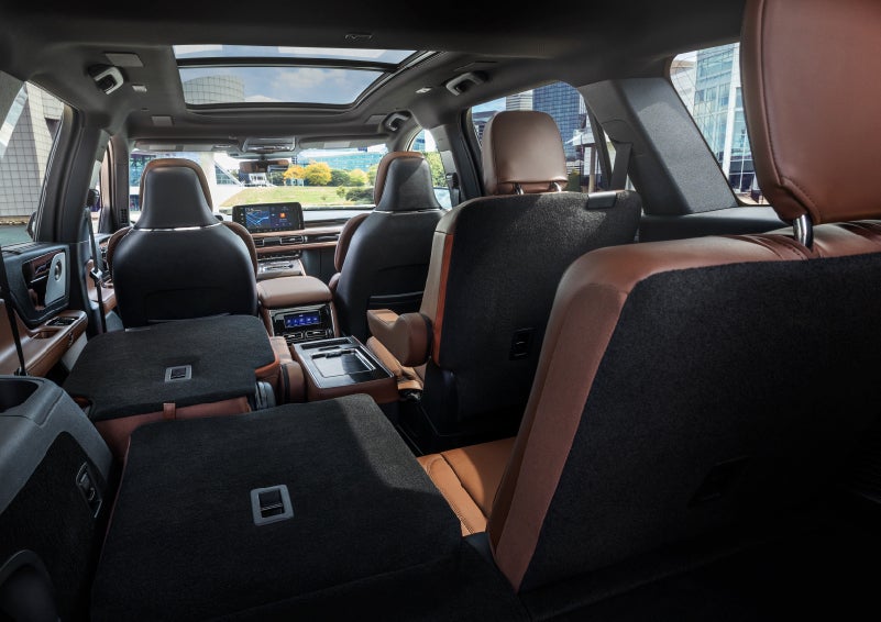 The interior of the 2025 Lincoln Aviator® SUV is shown with two seats folded down for added space. | Bergstrom Lincoln of Neenah in Neenah WI