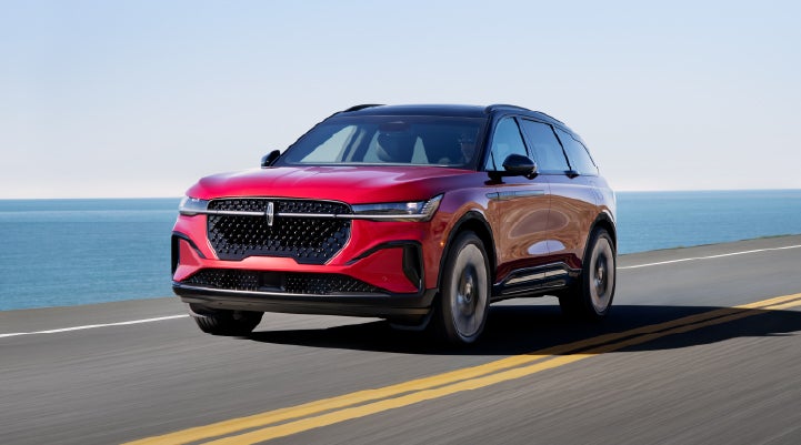 A 2025 Lincoln Nautilus® SUV is being driven on a seaside roadway. | Bergstrom Lincoln of Neenah in Neenah WI