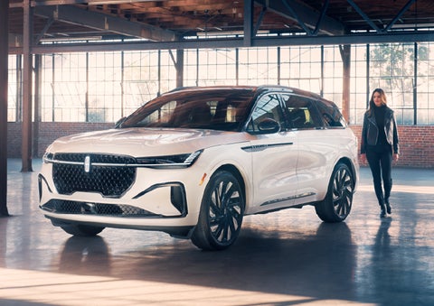 A person approaches a 2025 Lincoln Nautilus® SUV. | Bergstrom Lincoln of Neenah in Neenah WI