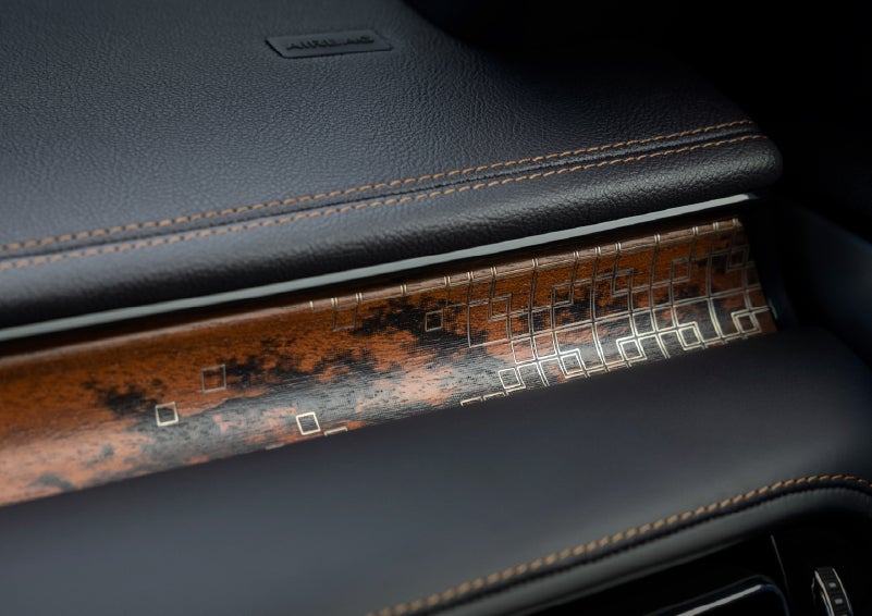 A close-up shot of the 2026 Lincoln Aviator® dashboard with unique black and brown accents and brown stitching. | Bergstrom Lincoln of Neenah in Neenah WI