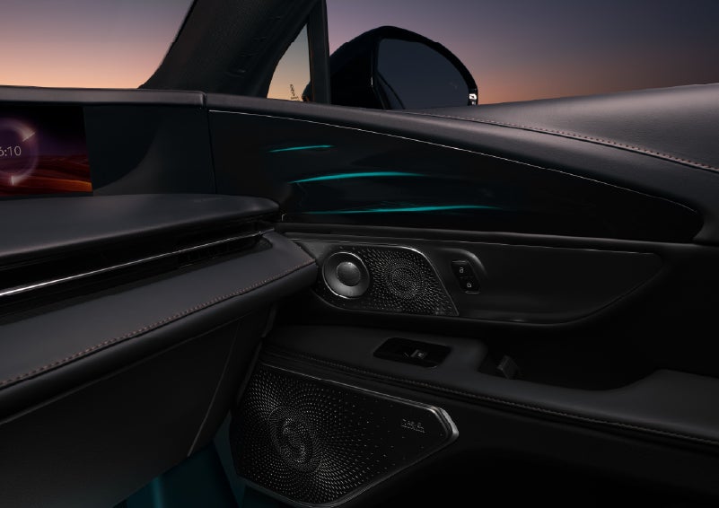 Selectable ambient lighting glows in the passenger door panel. | Bergstrom Lincoln of Neenah in Neenah WI