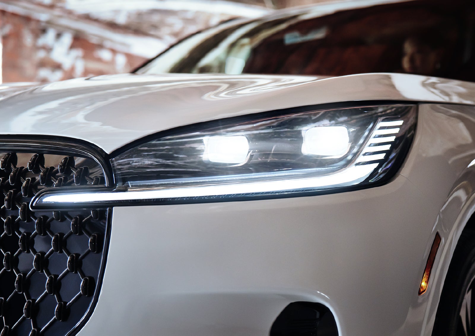 A close-up of a headlamp on the 2027 Lincoln Aviator® SUV is shown. | Bergstrom Lincoln of Neenah in Neenah WI