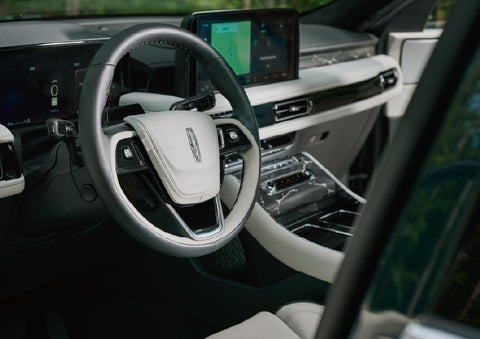 The leather-trimmed steering wheel of a 2027 Lincoln Aviator® Black Label™ SUV. | Bergstrom Lincoln of Neenah in Neenah WI